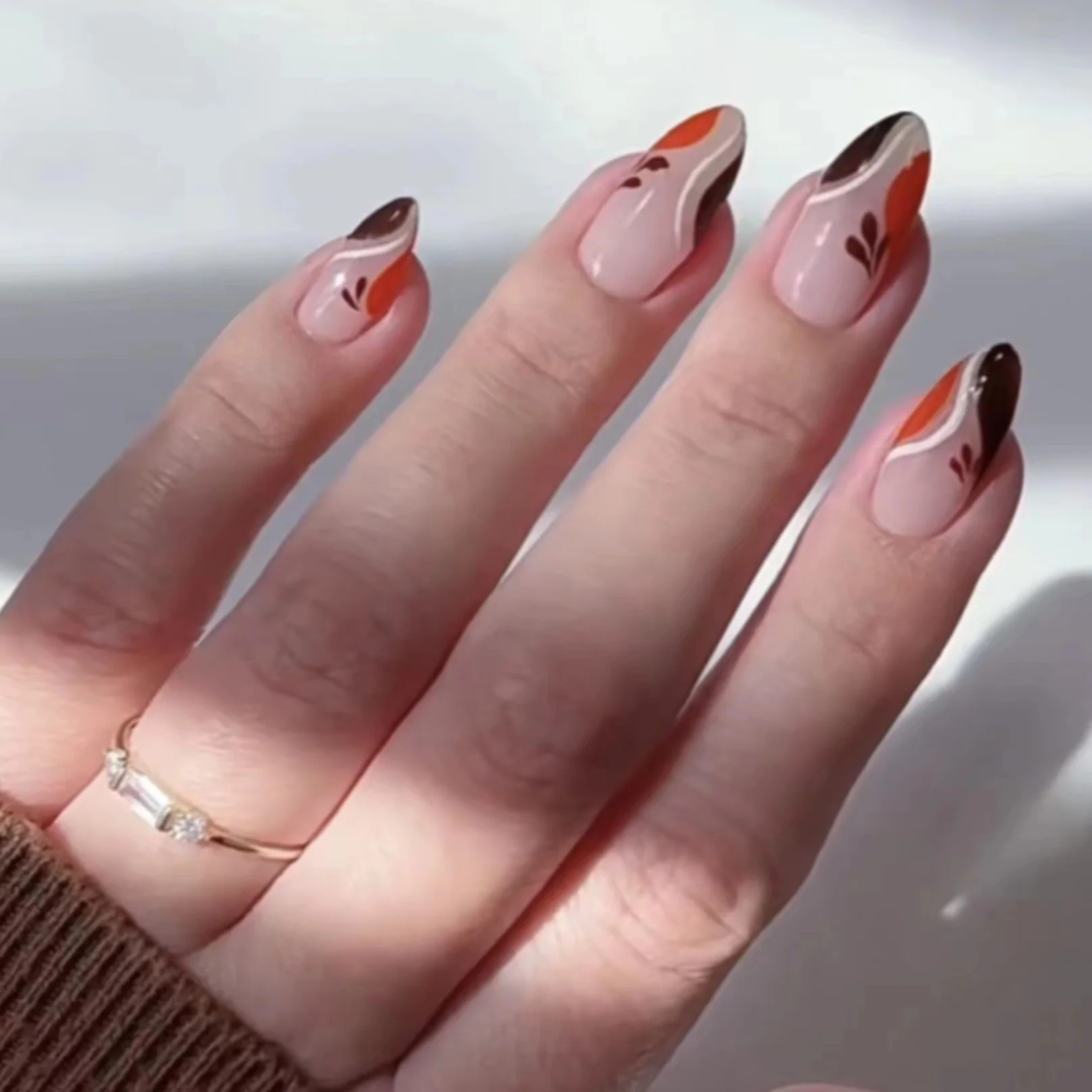 Autumn Elegance Medium Almond-Shaped Press On Nails in Gradient Browns with Leaf Accents