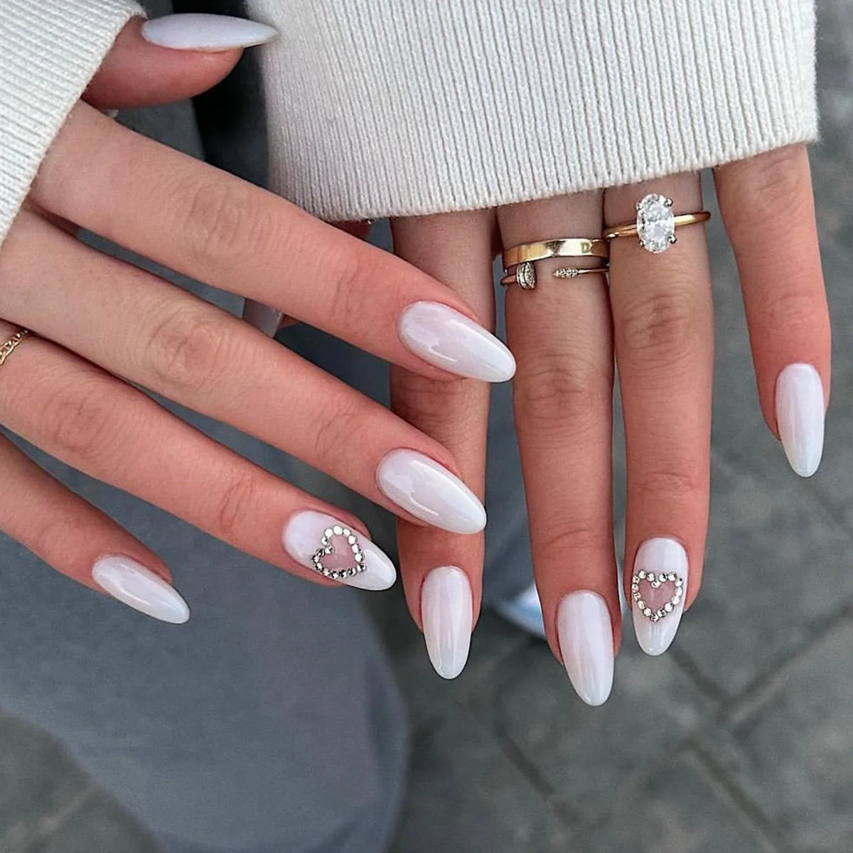 Charming Delight long almond shape glossy white press on nail set with heart rhinestone accents