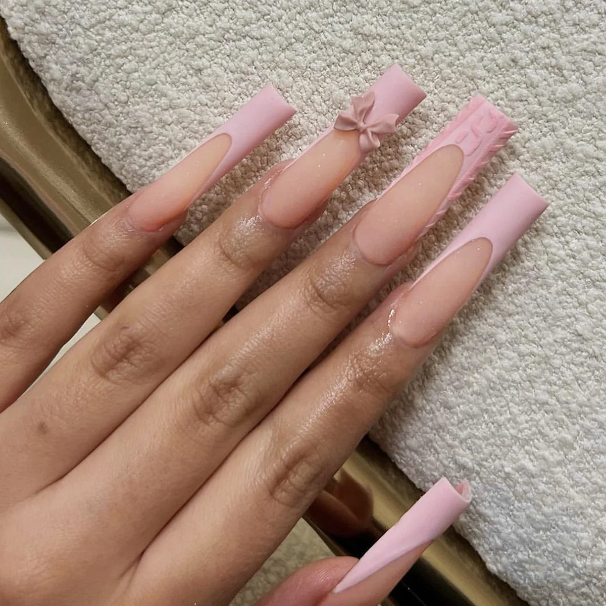 Chic Blossom Long Square Pink Press On Nail Set with Unique Cutout Design and Floral Accent