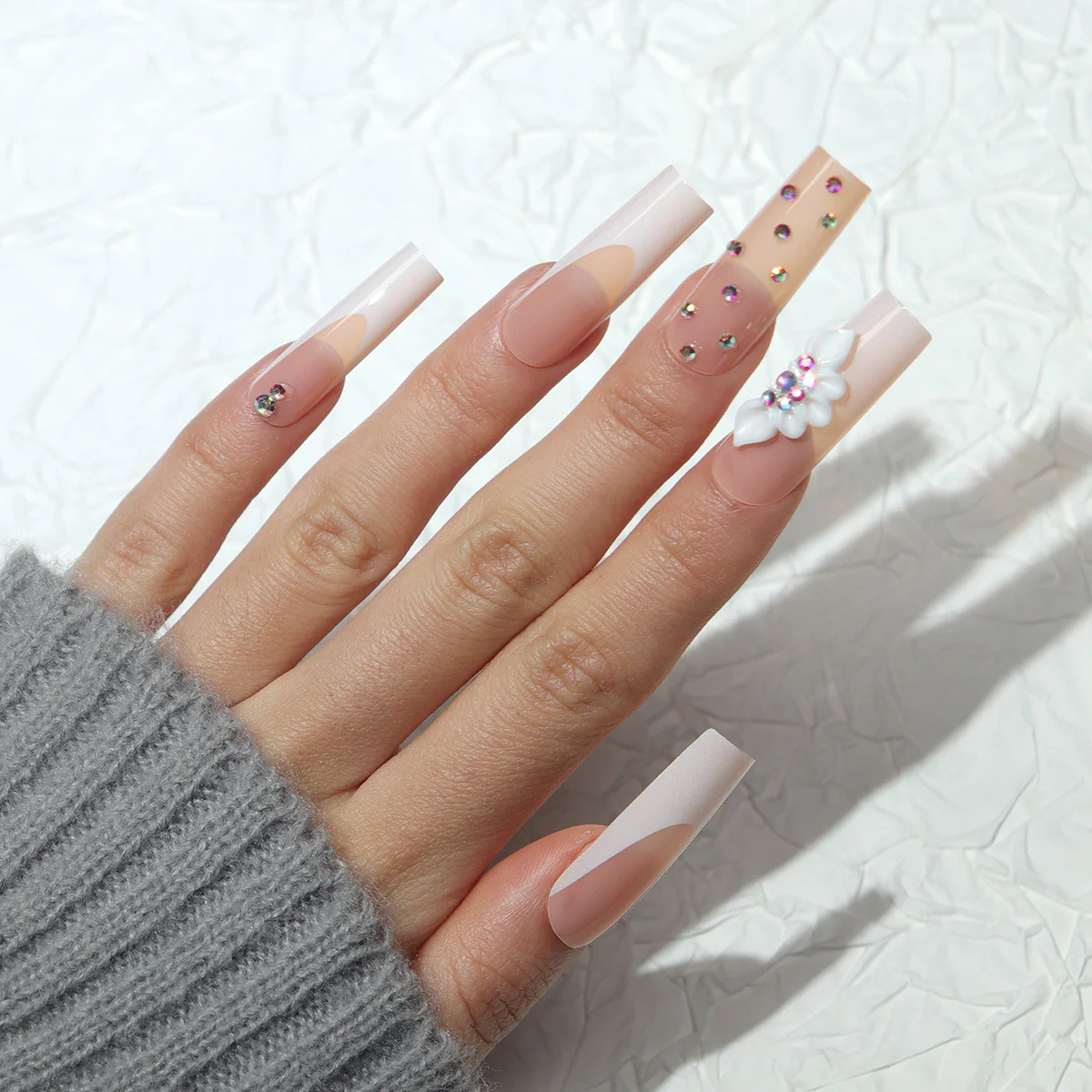 Chic Elegance Long Square Soft Pink Nails with Decorative Gems and Floral Accents