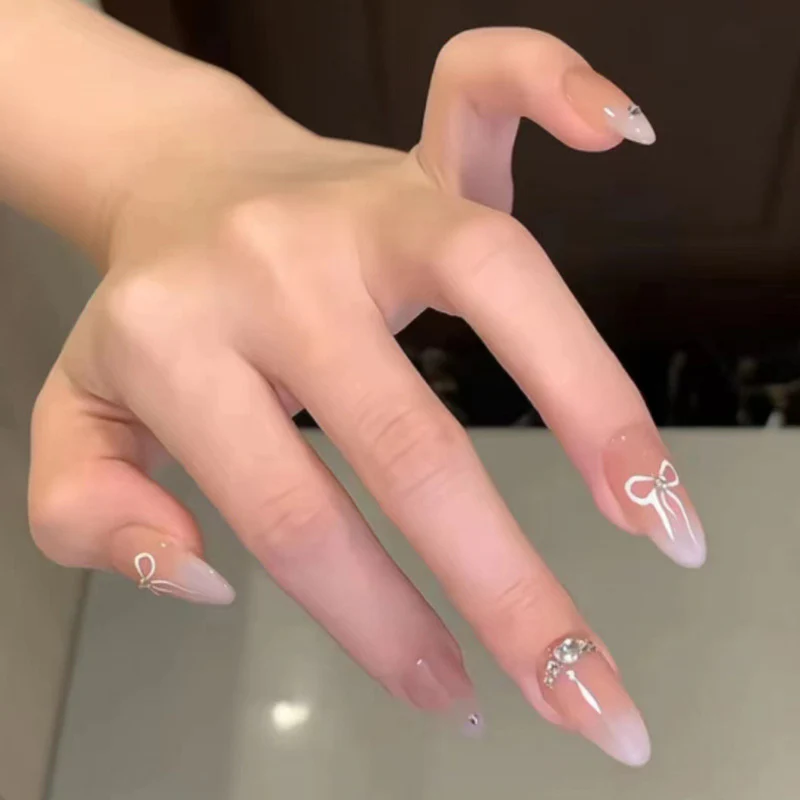 Chic Elegance Medium Almond Pink Ombre Press On Nail Set with Rhinestone and Bow Accents