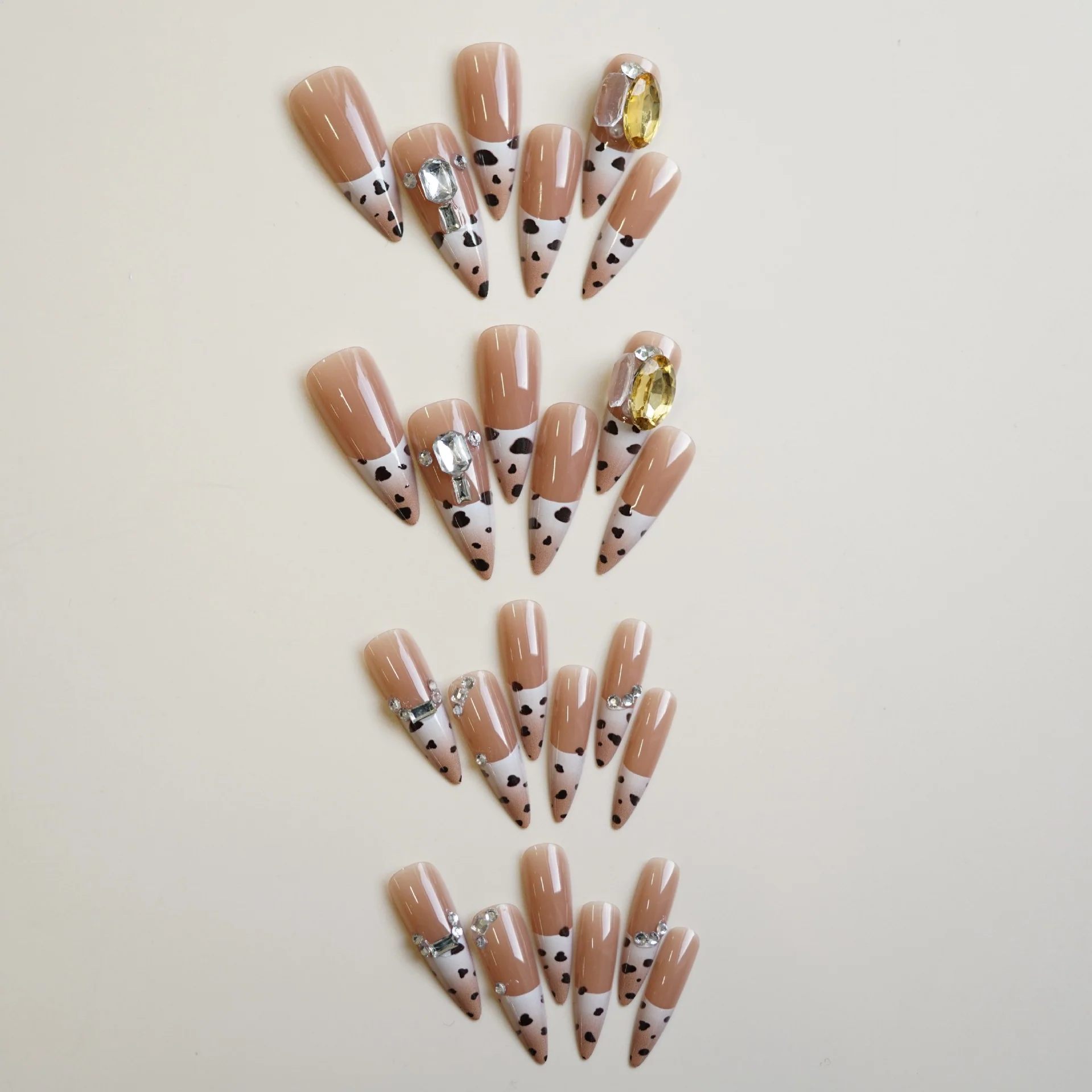 Chic Glamour Long Stiletto Coffin Beige with Colorful Gem Accents and Black Dot Design Press On Nail Set