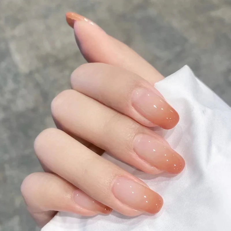Chic Simplicity Medium Oval Beige Press-on Nails with Subtle Sparkle