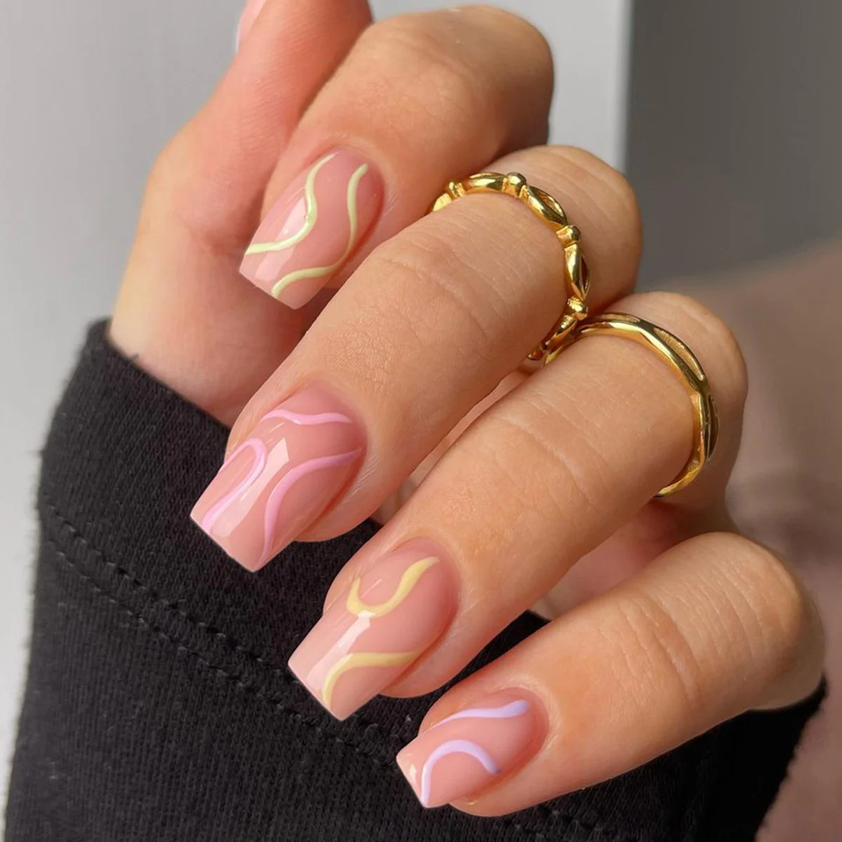 Chic Swirl Elegance Medium Length Coffin Shaped Pink and White Press On Nail Set with Abstract Art Design