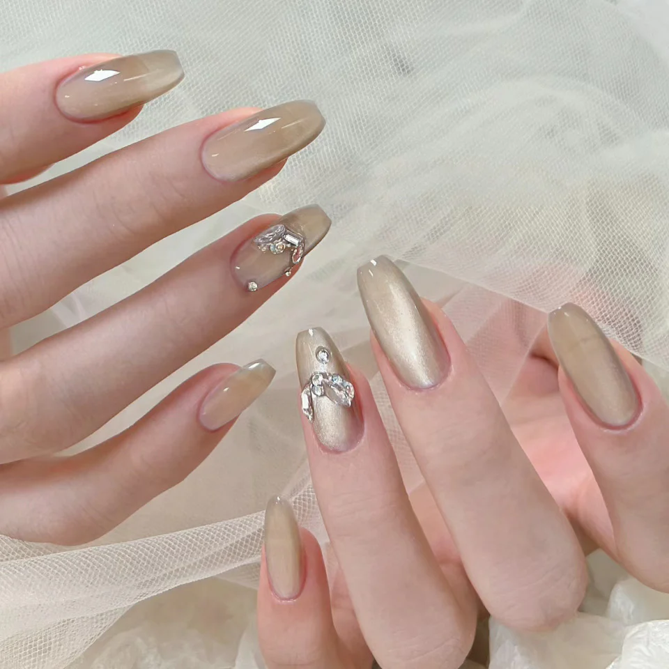 Elegant Glamour Press On Nail Set Long Coffin Beige with Sparkling Gem Accents