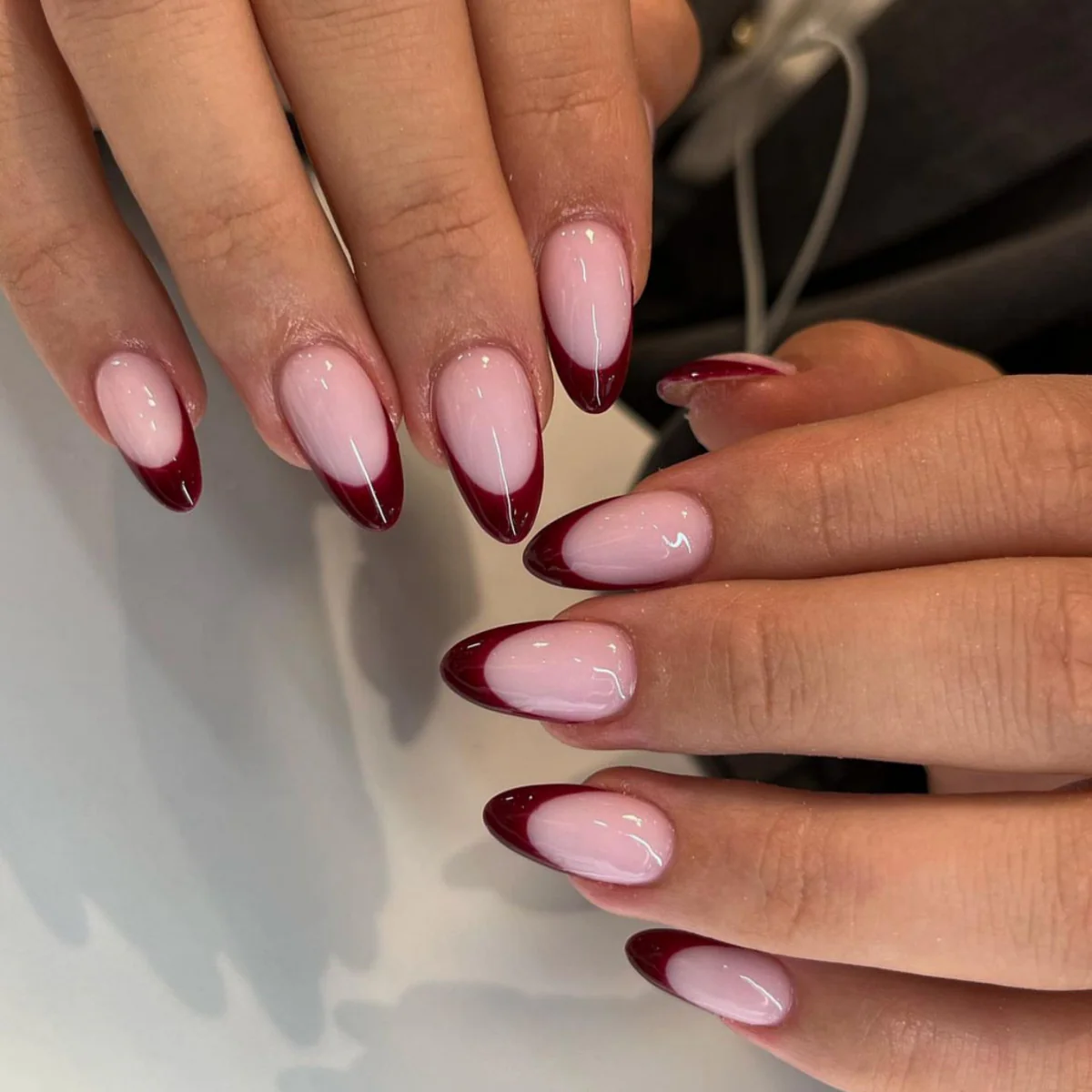 Elegant Romance Medium Almond Shaped Glossy Blush Pink and Burgundy Press on Nail Set with Unique Gradient Design