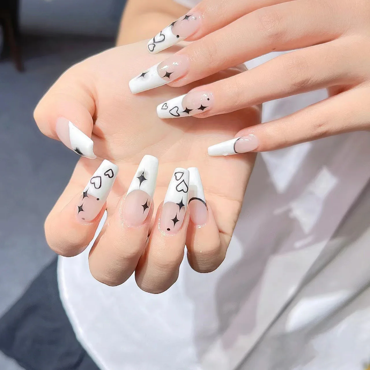 Enchanted Elegance Extra-Long Coffin White Press On Nail Set with Playful Heart & Star Designs