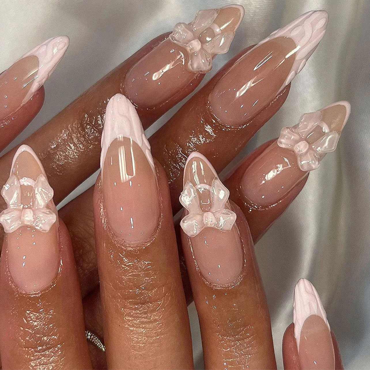 Enchanted Elegance Medium Almond Pink Press On Nails with Unique Bow Accents