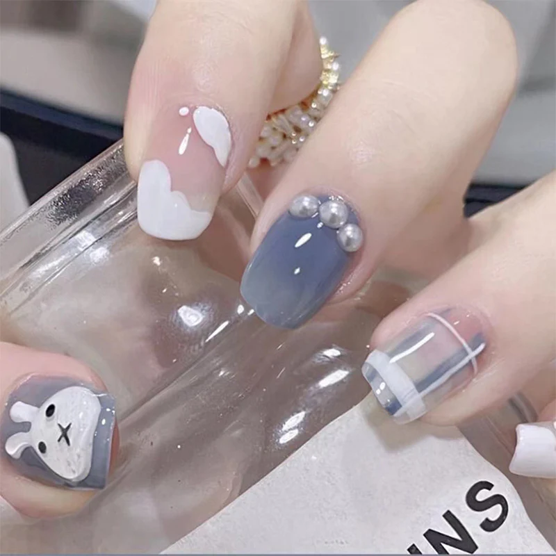 Enchanted Elegance Medium Round Shape Pastel Grey and Pink Press On Nails with Charmed Skull and Pearl Accents