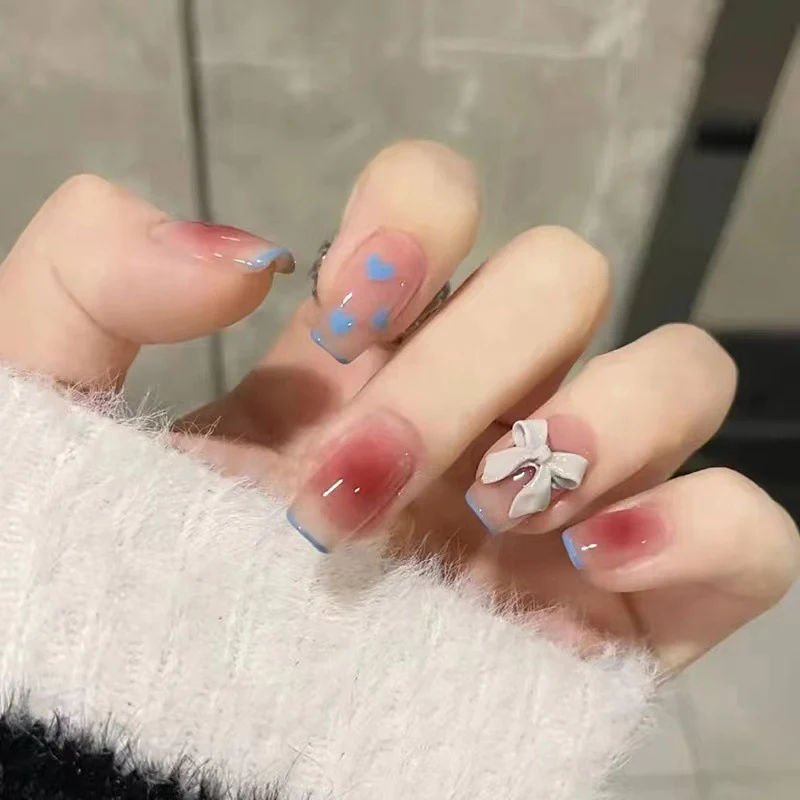 Enchanted Love Affair Medium Square Pastel Blue and Pink Press On Nail Set with Bow Accent