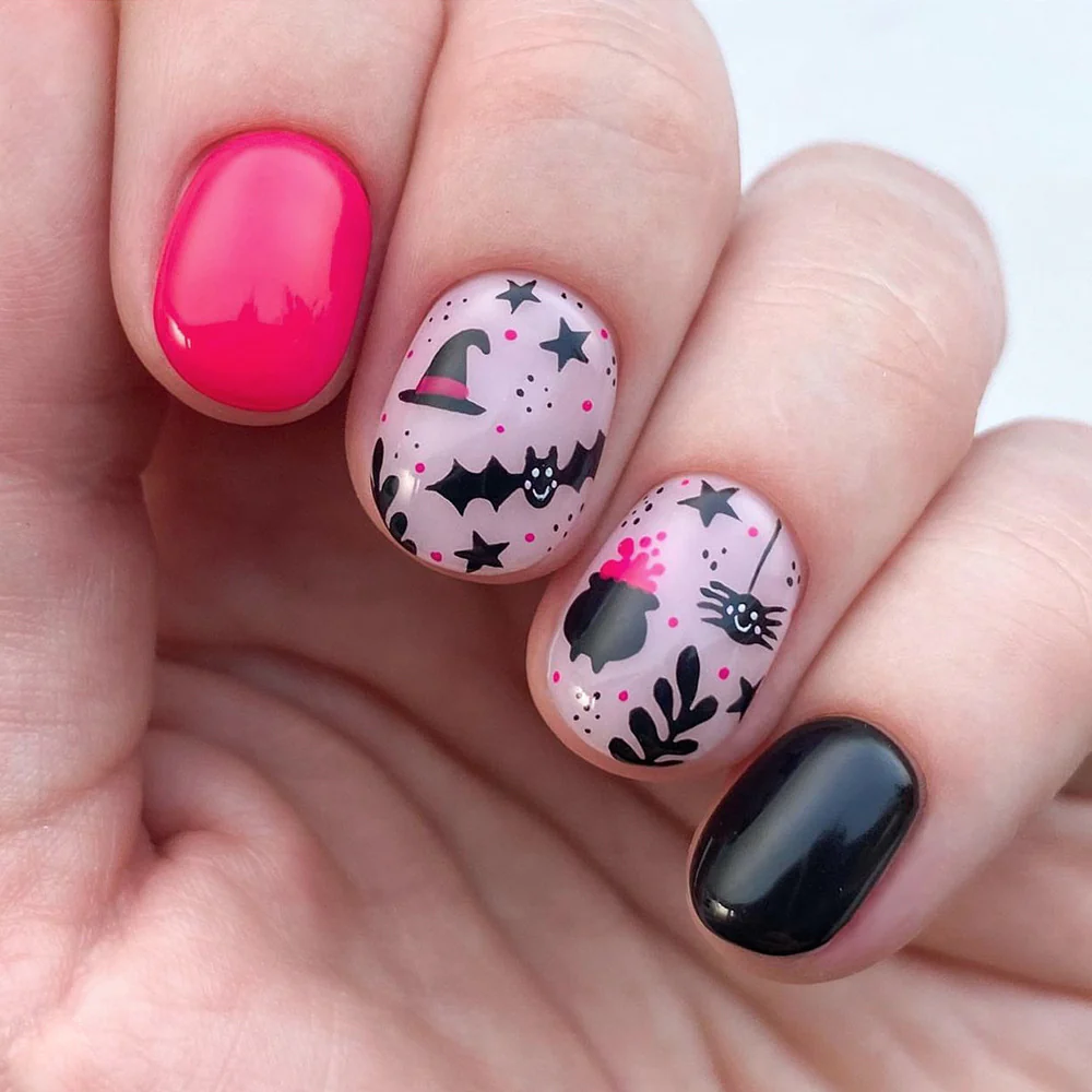 Enchanted Night Short-Length Oval Pink and Black Press-On Nail Set with Stars and Witchy Cat Accents