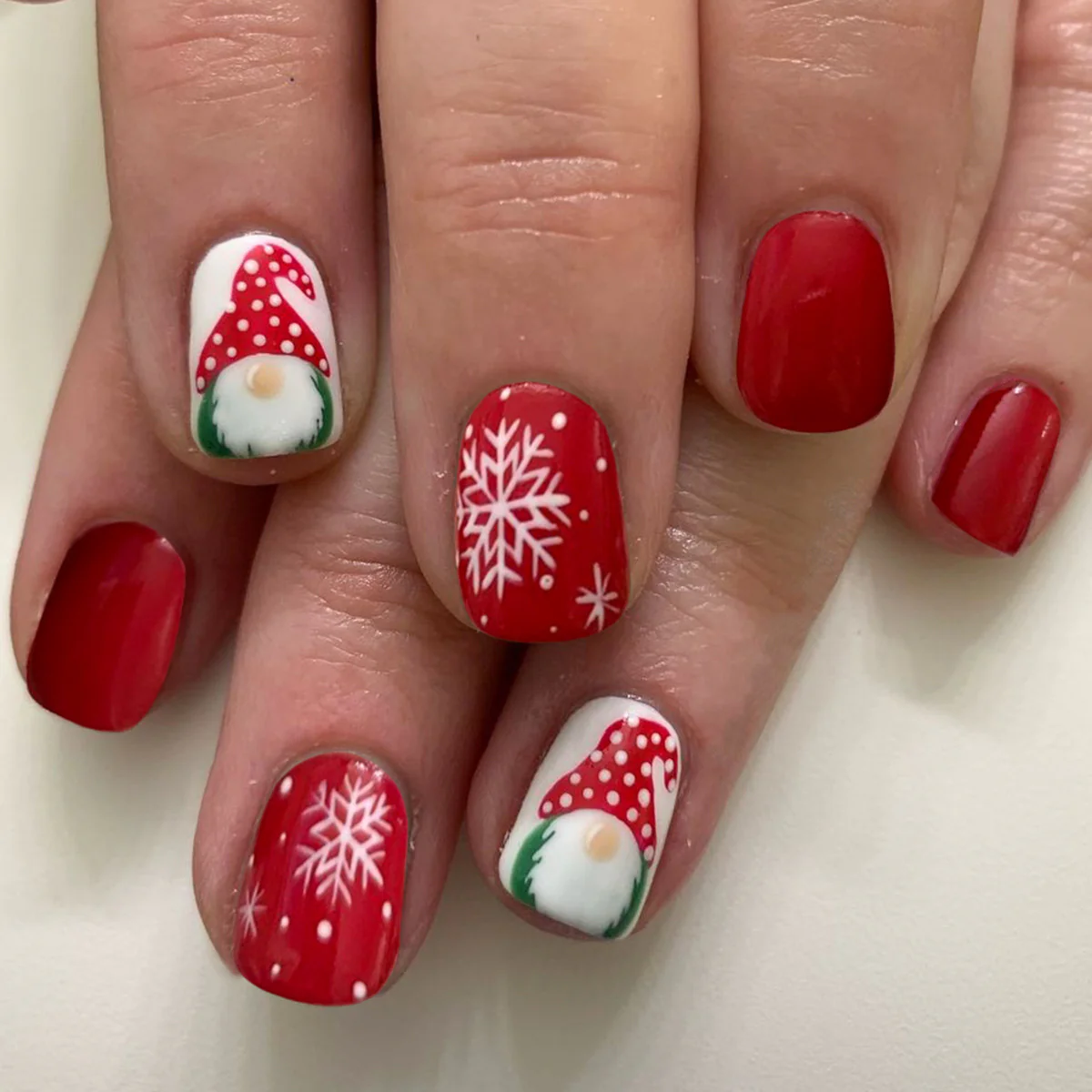 Festive Gnome Red Round Short Press On Nail Set with Snowflakes and Gnome Design