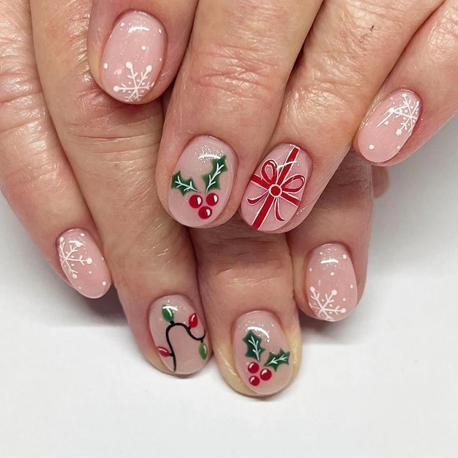 Festive Holiday Charm Short Oval Pink Press On Nail Set with Christmas Ornaments and Snowflakes