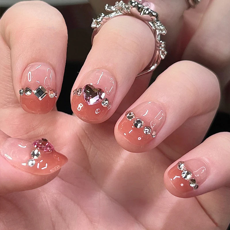 Glamorous Elegance Short Oval Pink Press on Nails with Dazzling Gem Accents