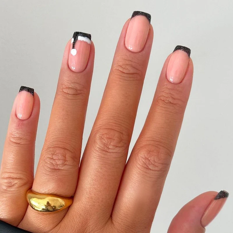Glamorous Night Sky Press On Nail Set Medium Length Square Shape Soft Pink with Black French Tips and Unique Glitter Accent