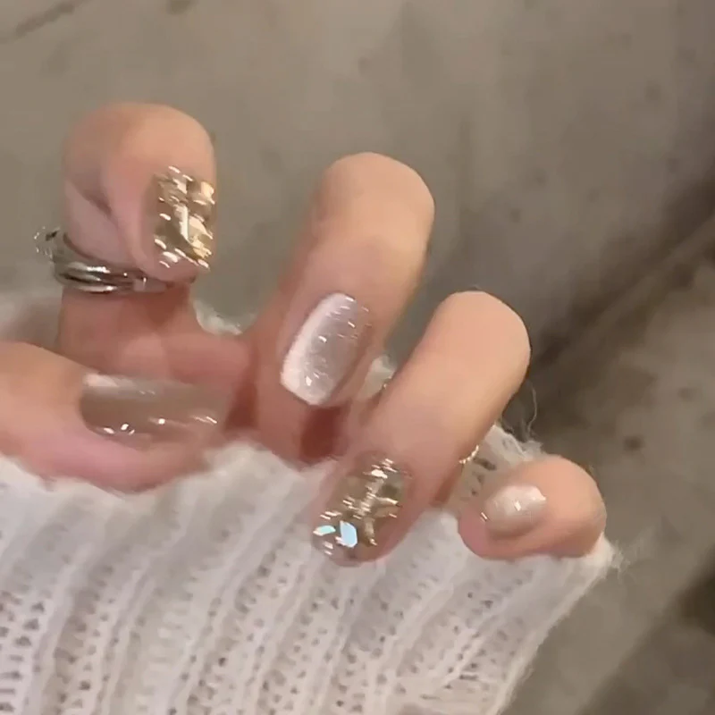 Glamorous Winter Wonderland Oval Medium Beige Glitter Press On Nail Set with Rhinestone Accents
