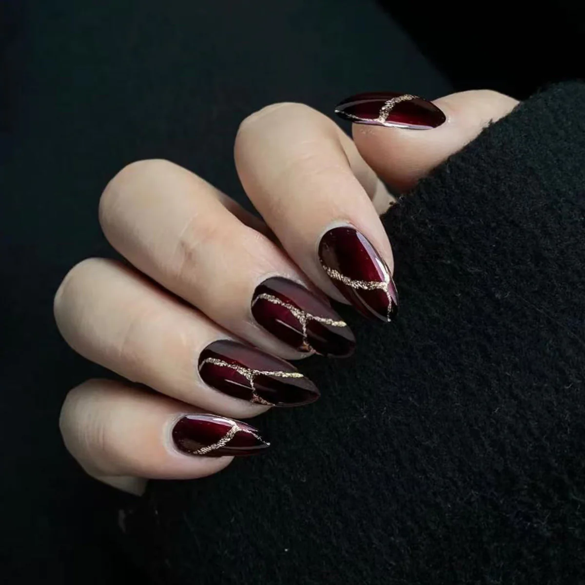 Gothic Elegance Medium Almond Burgundy Press On Nails with Glamorous Gold Accents