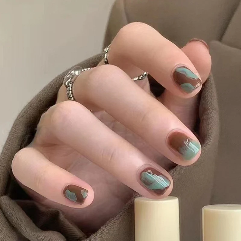Minimalist Chic Short Squoval Sage Green Press-On Nails with Abstract Art Design