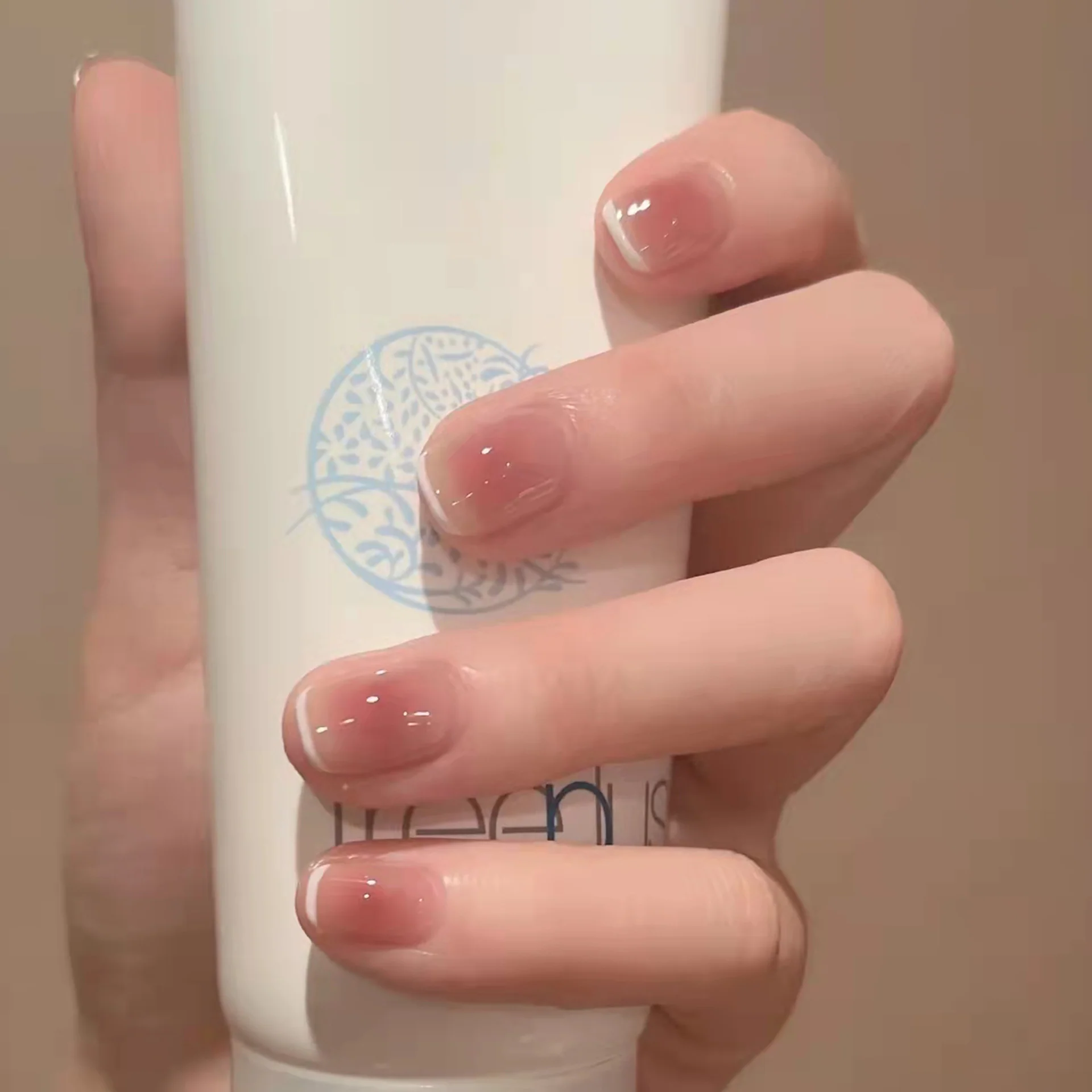Minimalist Elegance Short Squoval Natural Press-on Nail Set with High Gloss Finish
