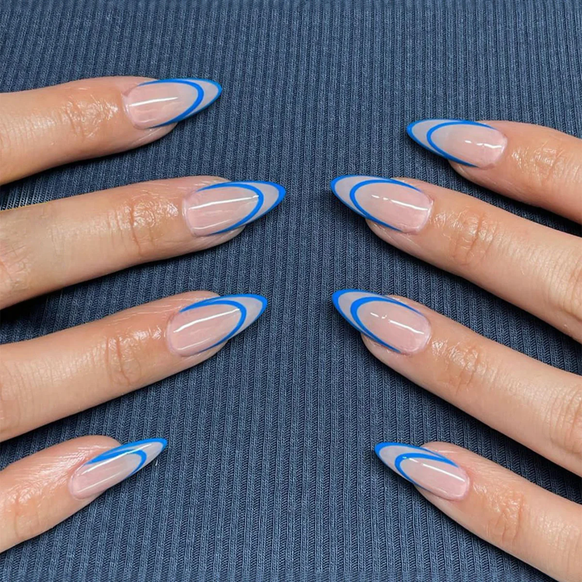 Modern Edge Long Almond Beige Press On Nails with Bold Blue Outline Design