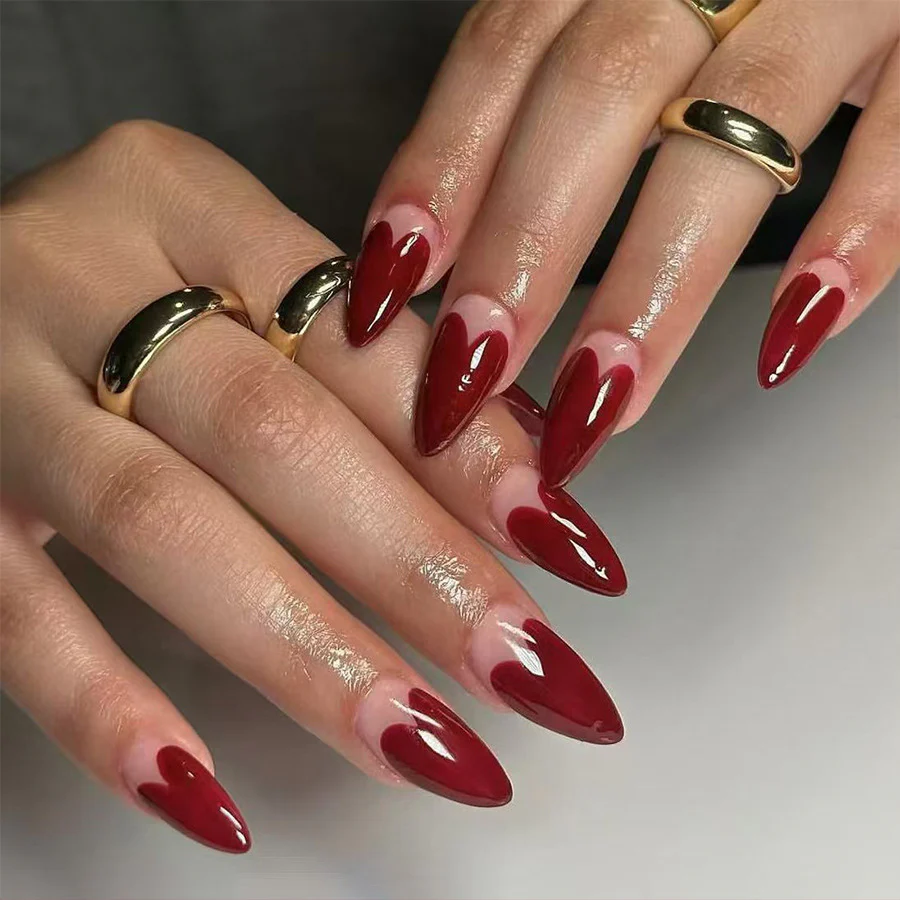 Romantic Elegance Medium Almond Shaped Deep Red Nail Set with Heart Design Feature