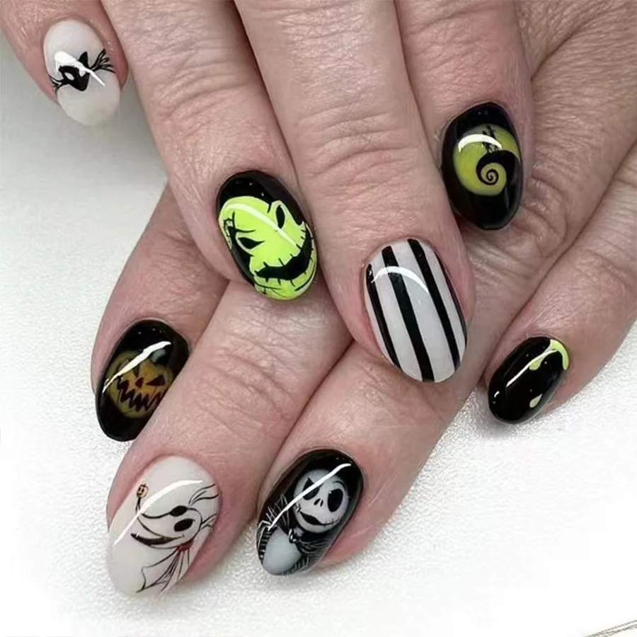 Spooky Elegance Medium Length Oval Shaped Press On Nail Set In Black And White With Halloween Themed Designs