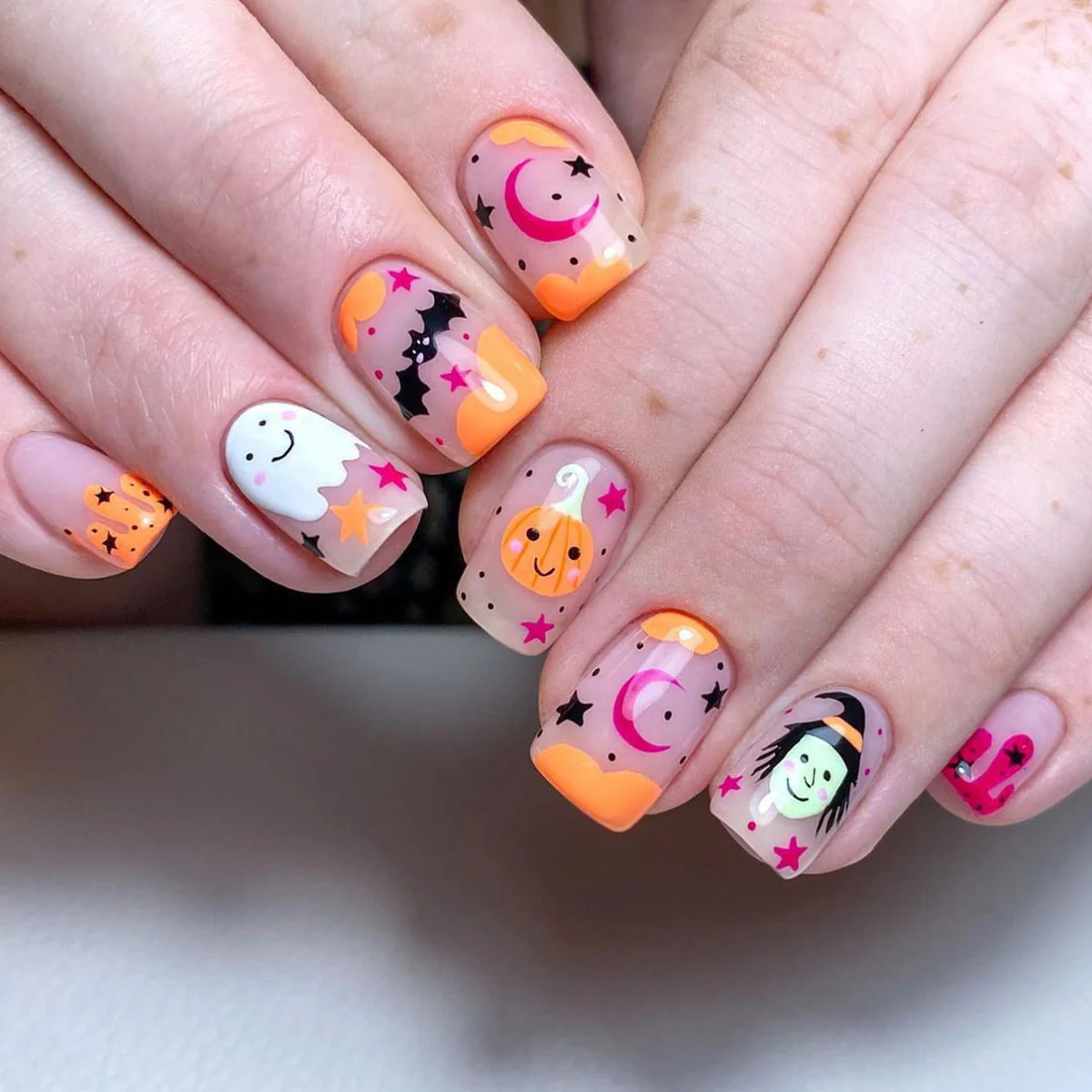 Spooky Elegance Medium Length Square Press On Nail Set with Multicolor Halloween Patterns and Glow-in-the-Dark Accents