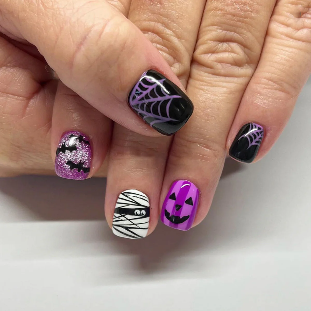 Spooky Halloween Medium Square Press On Nail Set Purple Black White Featuring Fun Spiderwebs and Jack O Lanterns