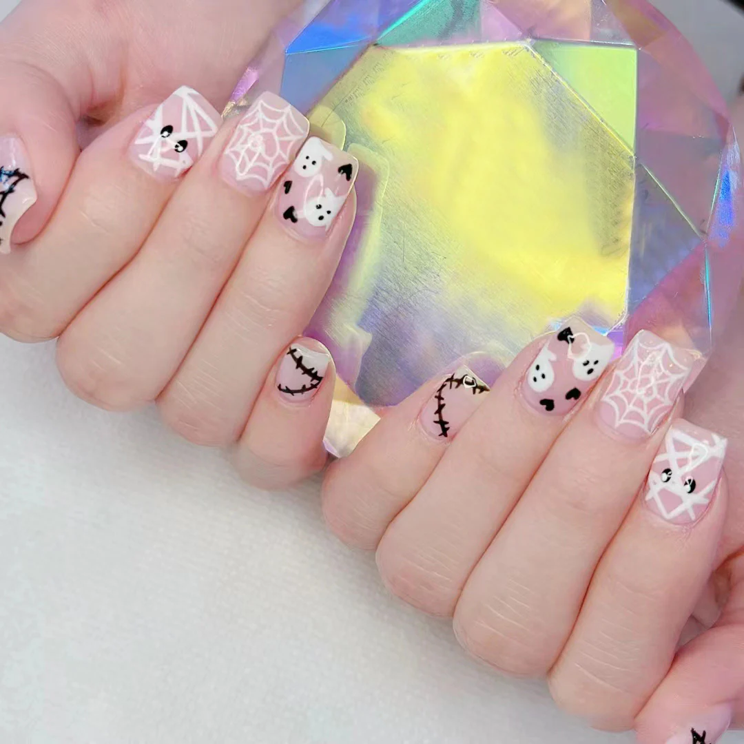 Spooky Halloween Themed Medium Square Pink and White Press On Nail Set Featuring Adorable Ghosts and Spiderwebs