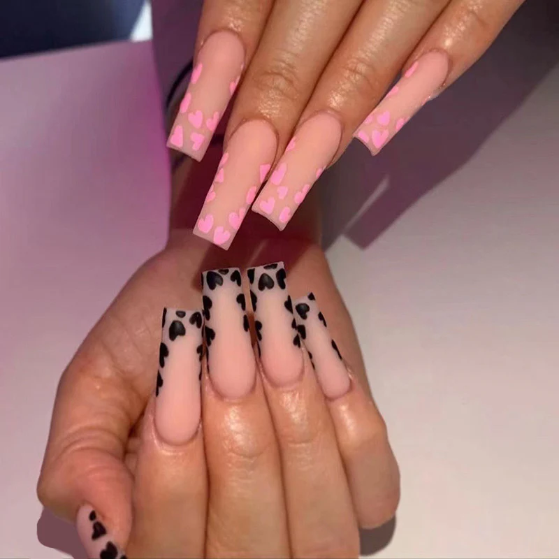 Sweetheart Glamour Long Coffin Baby Pink Press-On Nails with Heart Pattern and Black Accents