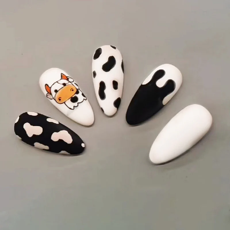 The Cutest Cow Medium Almond Black Animal Pattern Press On Nails
