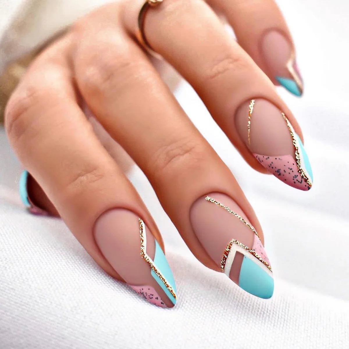 Tropical Escape Medium Almond Turquoise and Pink Press On Nails with Gold Glitter Accents and Speckle Detail