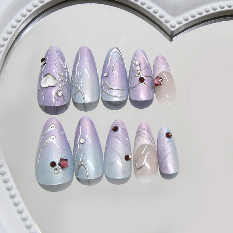 Whimsical Dreamscape Medium Almond Ombre Lavender and Blue Nail Set with Elegant Floral Accents and Gemstone Embellishments