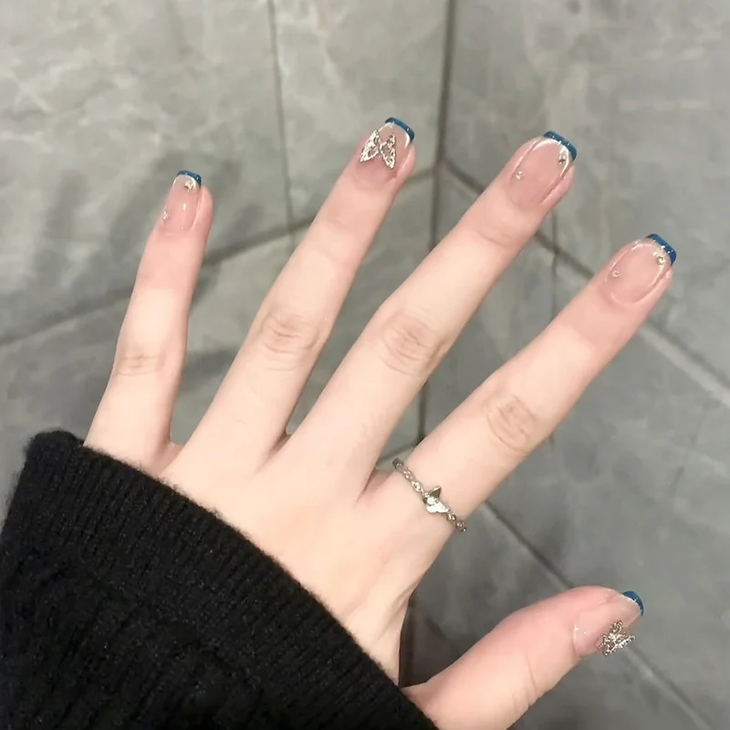 Whimsical Elegance Press on Nail Set Medium Square Clear with Blue Tips and Delicate Butterfly Accents